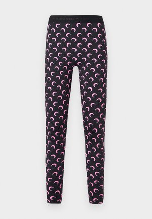 Black leggings featuring a repeating pink crescent moon pattern, soft texture, and an elastic waistband with branding.