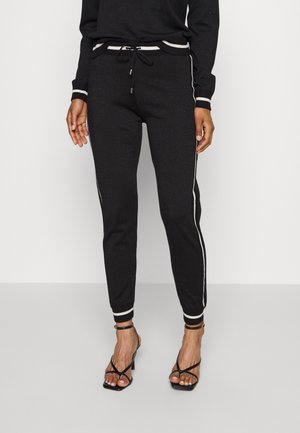 Pantalones deportivos - black