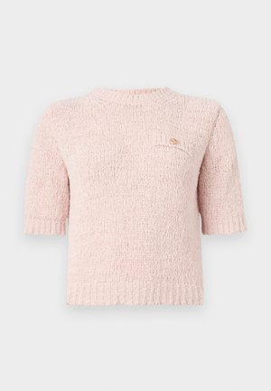 Short pink knitted sweater with a round neckline, short sleeves, and a small patch pocket featuring a gold logo detail.