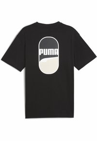 Juodas medvilninis marškinėliai su dideliu ovaliu baltu ir juodu "PUMA" logotipu nugaros pusėje. Trumpomis rankovėmis ir apvaliu kaklu.