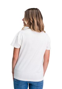 White cotton t-shirt with short sleeves, round neckline, and a relaxed fit. Smooth texture, plain design, and slightly curved hem.
