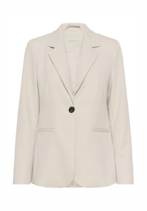 Blazer pour femme couleur crème à bouton unique, avec revers à encoches et deux poches fendues à l'avant, présenté sur un cintre.