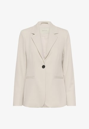 Blazer pour femme couleur crème à bouton unique, avec revers à encoches et deux poches fendues à l'avant, présenté sur un cintre.