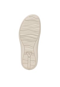 White rubber shoe sole with wave patterns, featuring a V logo and “VIONIC” text. Smooth texture with rounded edges and a tapered shape.