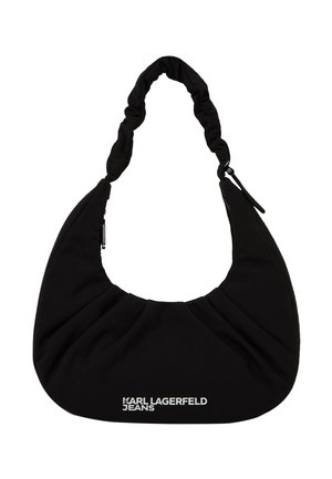 Mustast poolkuu kujuline õlakott, millel on polsterdatud sang ning esiküljel valge "Karl Lagerfeld Jeans" logo.