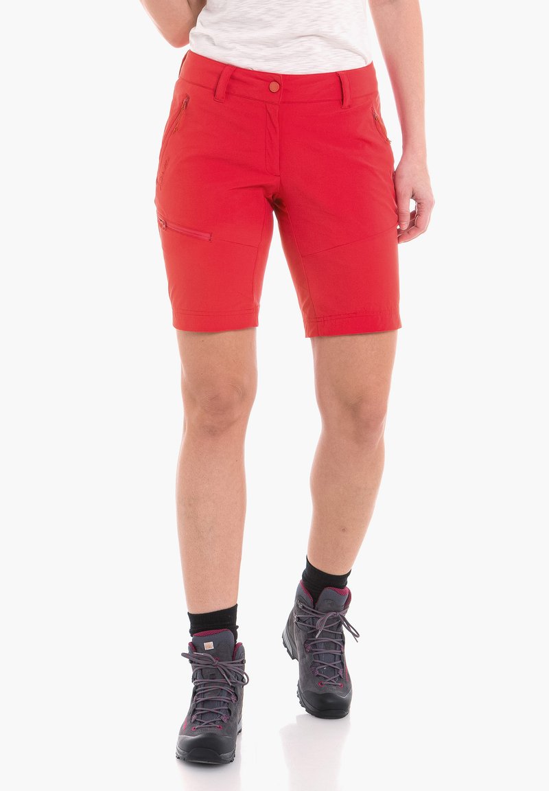 Rote Shorts mit schlanker Passform, aus leichtem Material gefertigt. Mit zwei Seitentaschen und einer Reißverschlusstasche am Oberschenkel, mit genähten Details.