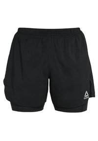 Černé sportovní šortky s elastickým pasem a malým logem Reebok. Mají rozdělené boky a lehký, hladký povrch.