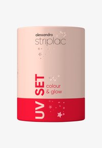 UV Set-product met een ronde beige verpakking en een rode basis. Bevat zilveren sterpatronen en bedrukt tekst: "alessandro striplac" en "kleur & gloed".