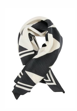 Sciarpa plissettata in bianco e nero con motivi geometrici triangolari e strisce, piegata e annodata su uno sfondo bianco.