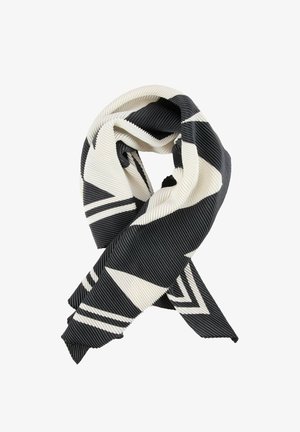 Sciarpa plissettata in bianco e nero con motivi geometrici triangolari e strisce, piegata e annodata su uno sfondo bianco.