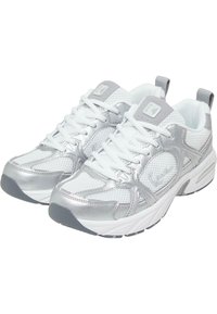 Silver athletic shoes with mesh and synthetic upper, white laces, padded collar, and a textured grey sole. Contoured shape for support.