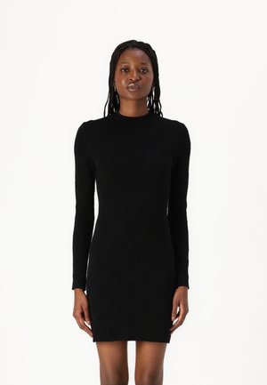 Black long-sleeve knit dress with a textured diamond pattern, form-fitting shape, and a crew neckline.