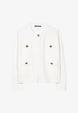 White cardigan featuring a round neck, front zip, and two chest pockets with gold-button accents; knit texture provides a soft appearance.