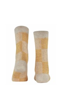 Stricksocken mit einem karierten Muster in Gelb und Beige, einem gerippten Bund und weicher Textur für Komfort.