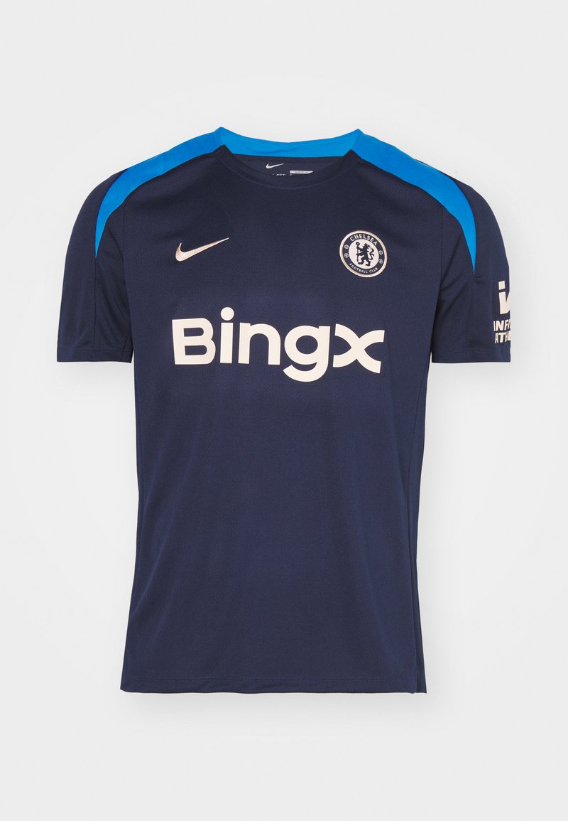 Granatowa koszulka piłkarska Nike z jasnoniebieskimi akcentami, z okrągłym dekoltem, krótkimi rękawami i kremowym logo "Bingx" z przodu. Zawiera herb Chelsea.
