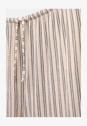 Světlé béžové tkaniny s vertikálními šedými pruhy, které mají na vrchu nařasený elastický pás s tkaničkou. Texturovaný, jemný povrch.