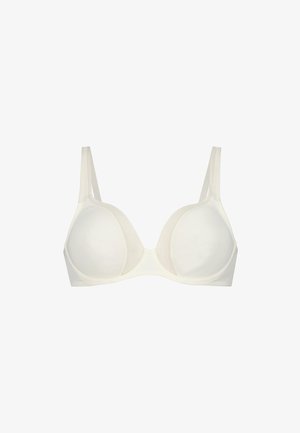 Soutien-gorge à armatures couleur crème avec des bonnets lisses et légèrement rembourrés, des bretelles ajustables et un design sans coutures pour une couverture uniforme.