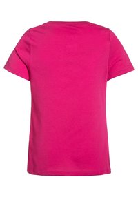 Short-sleeved, crew neck t-shirt in bright pink cotton. Features a smooth texture and standard fit without any patterns or embellishments.