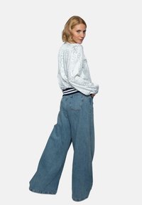 Emily van den Bergh Blouse - white blue letters