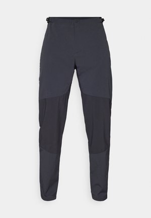 Tmavě šedé venkovní kalhoty s částečně světlejším šedým dolním úsekem, s uzávěrem na knoflík, poutky na pás a hladkým povrchem.