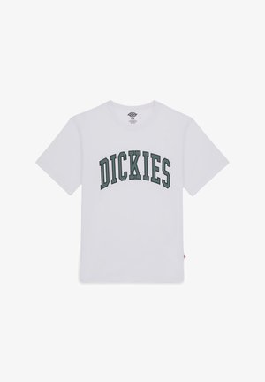 White cotton t-shirt featuring the word "DICKIES" in dark green, arched print across the chest. Crew neckline and short sleeves.