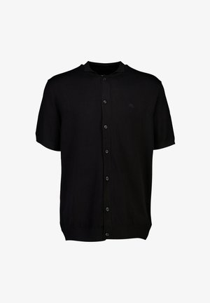 Gilet noir à manches courtes en tissu tricoté, avec un col, une fermeture à boutons et un logo discret sur la poitrine.