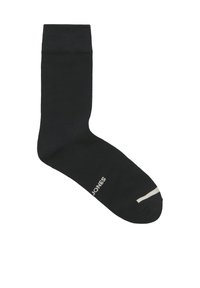 Zwarte sok met een gladde textuur, geribbelde boord en een witte accentstreep bij de teen. Heeft een klein "Jones" logo aan de zijkant.