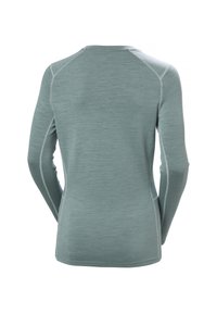 Lichtgewicht, langemouwen shirt in gedempt groen met een textuurstof, raglanmouwen en contrasterende stiksels langs de naden.