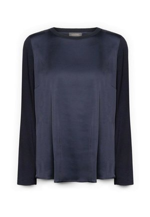 Marineblauw top met een gladde, satijnachtige voorkant en getextureerde gebreide lange mouwen. Klassiek ronde halsontwerp, met een ontspannen pasvorm en geen zichtbare sluitingen.