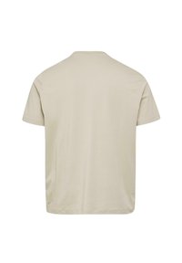 T-Shirt mit kurzen Ärmeln und Rundhalsausschnitt aus hellbeigem Baumwollstoff. Verfügt über ein einfaches, nahtloses Rückendesign und eine lockere Passform. Weiche Textur.