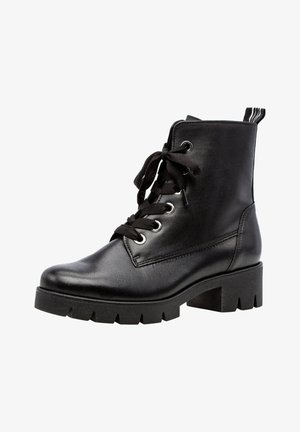 Black leather ankle boots with a rounded toe, lace-up front, silver eyelets, and a chunky tread sole with a heel accent.