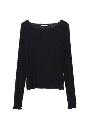 Langsleeve top in zwarte gestructureerde stof met een ronde hals, zijnaden en een iets gekorte zoom. Heeft een geribbeld patroon.