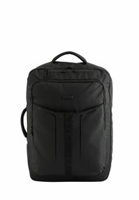 Mochila negra con superficie de tela suave, dos compartimentos con cremallera, un asa en la parte superior y detalles de cinta en la parte frontal para almacenamiento adicional.