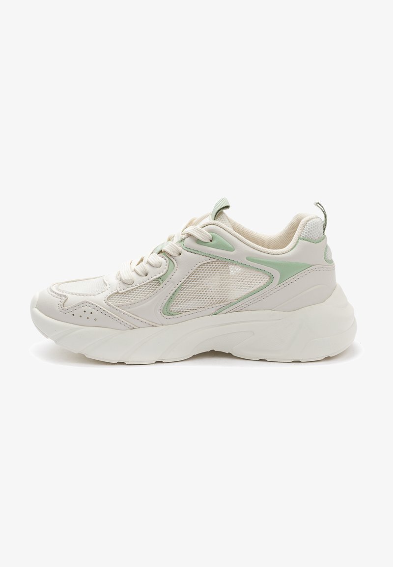 Sportliche Schuhe in Creme und Hellgrün, mit einem Mesh-Design, strukturierten Paneelen, runder Zehenpartie und dicker weißer Sohle mit leichtem Absatz.