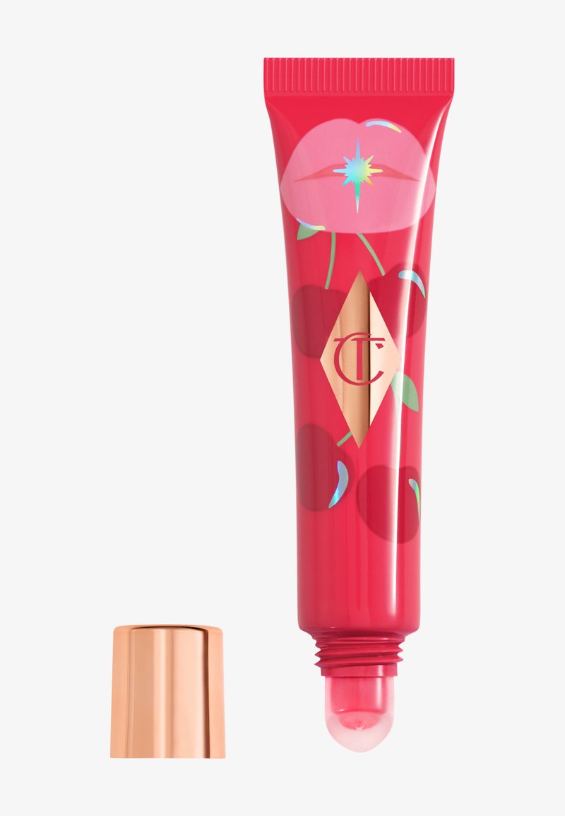 Red plastic tube with floral and cherry designs, featuring a roll-on applicator tip. Includes a metallic rose gold cap.