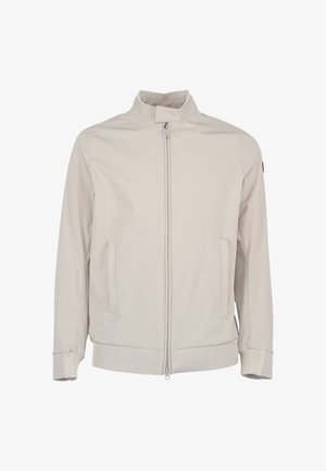 Lichtbeige jas met ritssluiting, hoge kraag, twee zijzakken en geribbelde manchetten en zoom, weergegeven op een witte achtergrond.