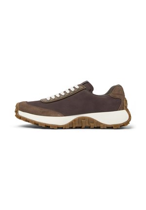 Brown sneaker with white laces, featuring a textured upper and a rugged rubber sole, displayed on a white background.