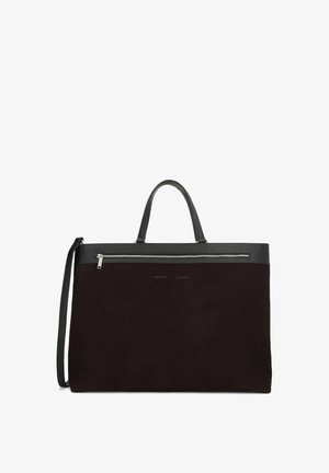 Große schwarze Tragetasche mit Ledergriffen, einem abnehmbaren Schultergurt und einer horizontalen Reißverschlusstasche nahe der Oberseite.