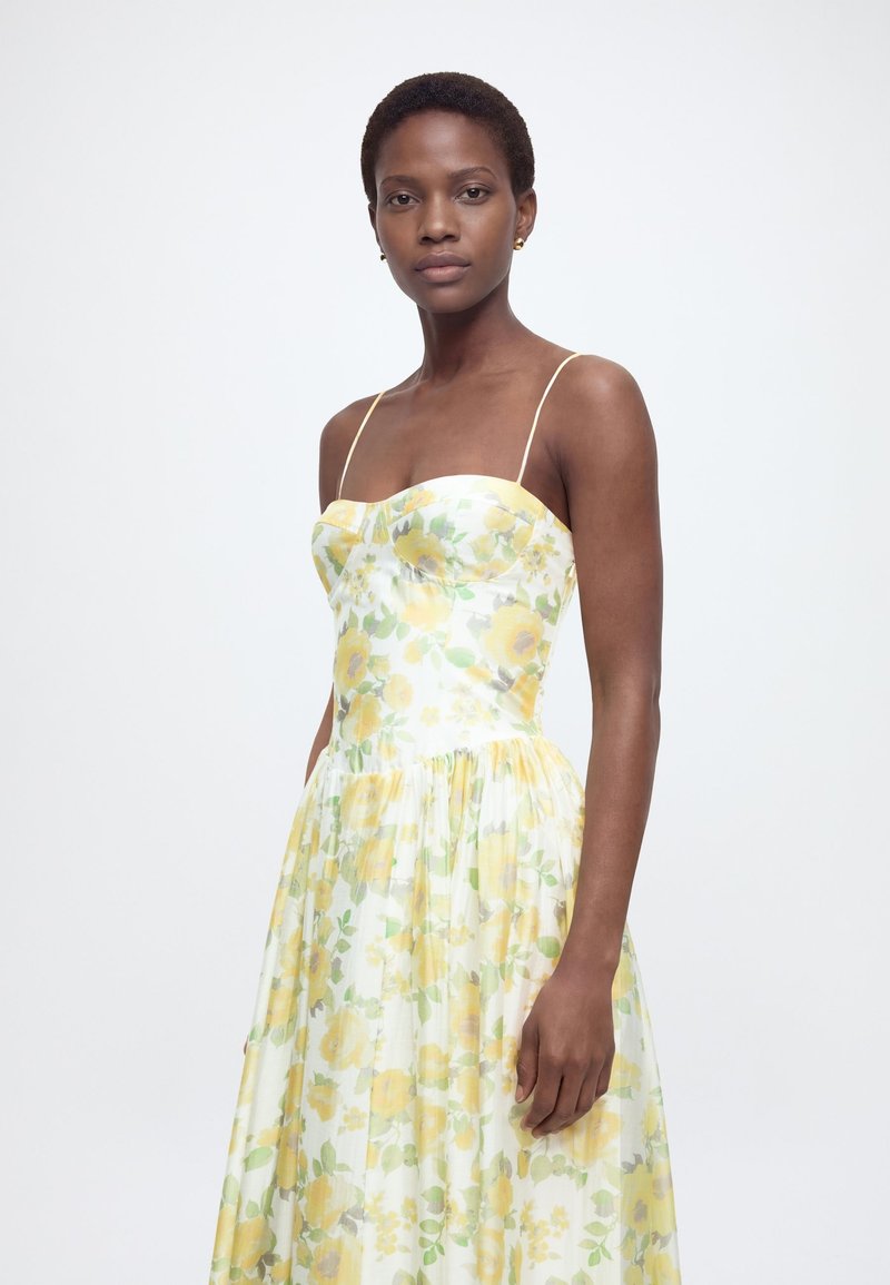 yellow ditsy print bardot frill hem skater dress PrettyLittleThing bardot frill hem skater dress in yellow ditsy floral print