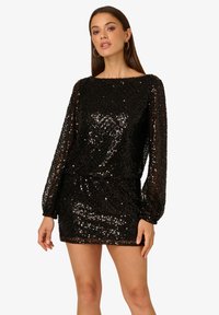 Czarna cekinowa mini sukienka z długimi rękawami, okrągłym dekoltem i dopasowanym krojem. Teksturowana, błyszcząca powierzchnia z precyzyjnym wykończeniem.