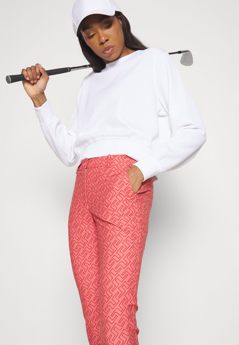 Damen Sportbekleidung | J.LINDEBERG PIA PRINT GOLF PANT Stoffhose faded rose/rosa - UD27771 Damen Sportbekleidung | J.LINDEBERG PIA PRINT GOLF PANT Stoffhose faded rose/rosa - UD27771