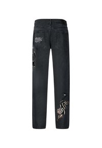 Jeans de mezclilla negra con diseños bordados de un tigre y una calavera en los bolsillos traseros, con corte recto y pasadores para el cinturón.