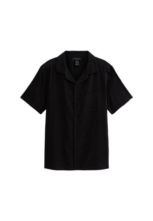 Chemise à manches courtes noire boutonnée en tissu texturé, dotée d'une poche poitrine et d'un col camp.
