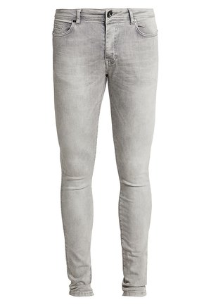Lichtgrijze skinny jeans van denim, met een traditionele vijf-pocket ontwerp, knoopsluiting en subtiele vervaging in de stof.