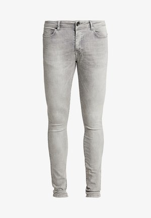 Lichtgrijze skinny jeans van denim, met een traditionele vijf-pocket ontwerp, knoopsluiting en subtiele vervaging in de stof.