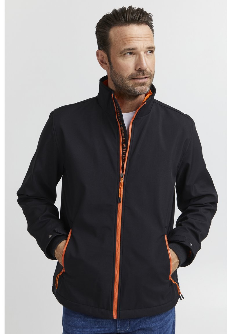 Black jacket with orange zippers and accents, high collar design, two front pockets, and a smooth material texture. Casual fit.