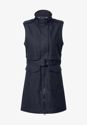 Ärmellose dunkelblaue Weste mit hohem Kragen, Reißverschluss vorne, Gürteltasche und zwei vorderen Taschen mit Klappenverschluss. Das Material hat eine glatte Oberfläche.