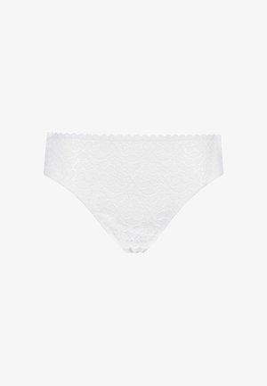 Slip in pizzo bianco con motivi floreali, vita scallop e texture liscia. Il design è senza cuciture e a vita bassa.