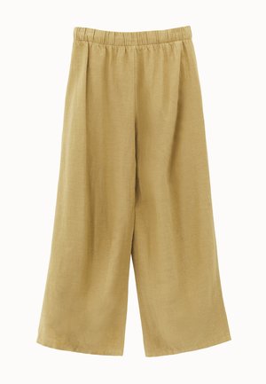 Beige, wijde broek met hoge taille en elastische tailleband, gemaakt van lichtgewicht, gestructureerde stof, plat neergelegd tegen een effen achtergrond.