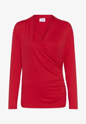 Red long-sleeve wrap top made from soft material, featuring a V-neckline, gathered side detail, and a smooth texture. Brand label visible.